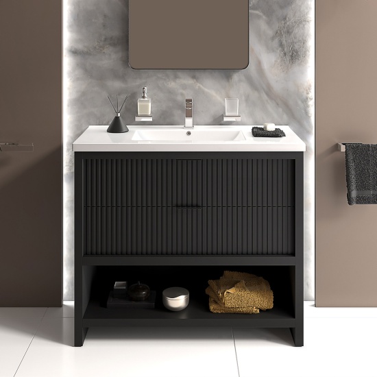 jasmine black 1000mm vanity unit with chrome handles, btw toilet unit and 1700 & 1800mm bath