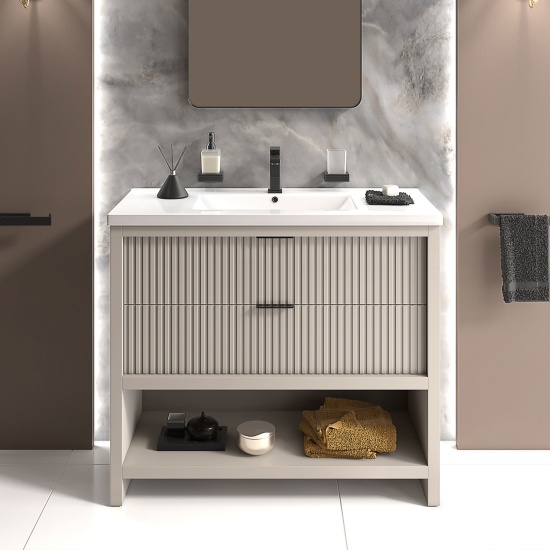 jasmine cashmere 1000mm vanity unit with black handles, btw toilet unit and 1700 & 1800mm bath